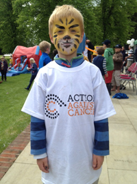 Little boy with tiger face paint