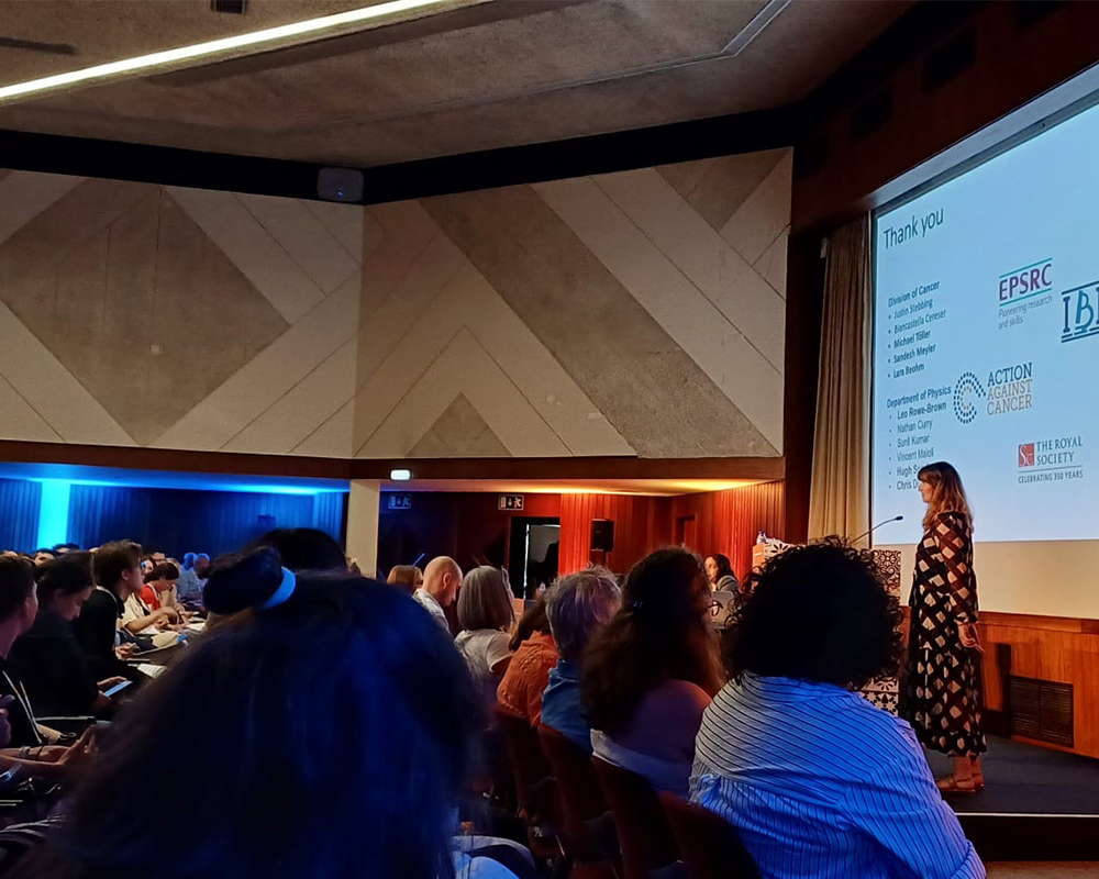 Female speaking in lecture room